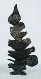 Tukiki Manomie, Collage, 2001, dark green stone carving