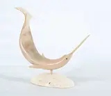 Donald Notaina, Narwhal, horn and stone sculpture