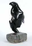 Charlie Okpik, Untitled - Bird, mottled black stone sculpture