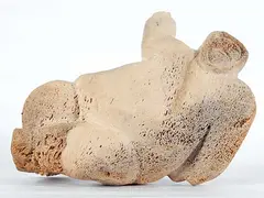 Clive Riber, Untitled - Reclining Inuk, bone carving