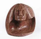 Lorne Fineday, Untitled - Quiet Hollow, mottled red stone sculpture