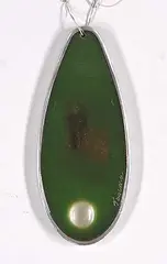 Tony Tascona, Untitled - Green Medallion, cast resin with metal rim