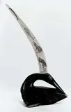 Kiugak Ashoona, Untitled - Bird and Tusk with Scrimshaw, green stone and ivory carving