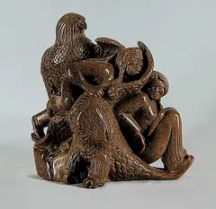Courtship by Clifford Pettman, brown stone carving, sold Nov 2007