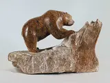 Dorothy M. Willford, Bear Over Stump, brown stone carving