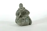 Charlie Kalingoapik Angutigirk, Untitled - Hunter and Seal, light green stone carving with bone