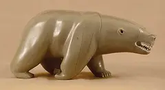 Bear by Lucassie Takatak, carving in light grey stone, sold Apr 1996