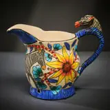 Zebra milk jug with yellow flowers by Ardmore Ceramic Studio, 2003, painted and glazed ceramic, offered Jun 2026