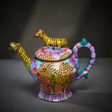 Ardmore Ceramic Studio, Zebra teapot with blue flowers, 2002, painted and glazed ceramic
