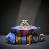 Chameleon lidded vessel by Ardmore Ceramic Studio, 2002, painted and glazed ceramic, offered Jun 2026