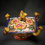 Ardmore Ceramic Studio, Camel and flower lidded vessel, 2002, painted and glazed ceramic