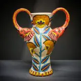 Ardmore Ceramic Studio, Orange elephant vase with handles, 2004, painted and glazed ceramic
