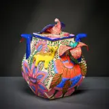 Ardmore Ceramic Studio, Bird, jackal and flower lidded vessel