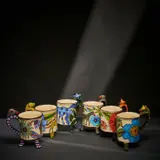 Ardmore Ceramic Studio, Set of six animal mugs, 2003, painted and glazed ceramic