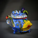 Ardmore Ceramic Studio, Blue elephant and yellow flower teapot, 2005, painted and glazed ceramic