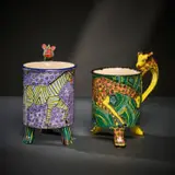 Ardmore Ceramic Studio, Pair of zebra and giraffe mugs, 2002, painted and glazed ceramic
