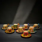 Ardmore Ceramic Studio, Set of eight animal espresso cups and saucers, painted and glazed ceramic