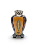 Andile Dyalvane, Claw-footed vase painted with abstract patterns and feather motifs, 2000, painted and glazed ceramic