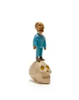 Conrad Botes, Untitled (Figure Standing on a Skull), 2010, carved and painted wood