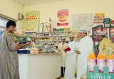 Hasan Essop and Husain Essop, Datar's Spice Shop, 2006, photographic print on paper