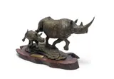 Keith Calder, Rhino Mother and Calf, 1989, bronze with a brown patina, on a wooden base