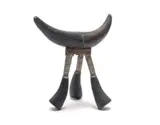 East African Headrest by East Africa Unrecorded artist, carved and painted wood and tanned cow hide, sold Mar 2026