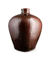 Esias Bosch, Large triangular vase with textured surface, stoneware with iron glaze and relief decoration