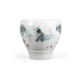 White bowl with blue fish and red spots by David Schlapobersky and Felicity Potter, porcelain painted with oxides, sold Jan 2026