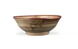 Esias Bosch, Green and brown bowl with flower motif, stoneware with semi-matte celadon glaze and iron decoration