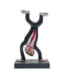 Norman Catherine, Handstand Black Suit, painted and carved wood, on a wooden base