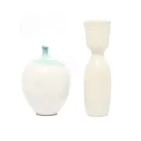 Thelma Marcuson, Porcelain vase and bottle, two, (1) porcelain with glaze and blue oxide; (2) porcelain with matt white glaze and incised motif