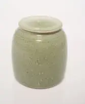 Peter Jaff, Celadon lidded jar with relief linear motif, Celadon glaze on white stoneware