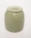 Peter Jaff, Celadon lidded jar with relief linear motif, Celadon glaze on white stoneware