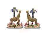 Ardmore Ceramic Studio, Pair of candle sticks with giraffe, palm tree and flower motifs, two, 2004, painted and glazed earthenware