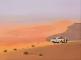 Peter Bonney, Desert Landscape with Figure, Vehicle and Antelope, 1986, oil on canvas