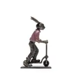 Carol Cauldwell, Rabbit on a Scooter, painted and patinated bronze with wax, on a painted steel base