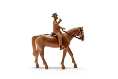 Horse and Rider with Pipe by Julius Mfethe, carved wood and leather, sold Feb 2026