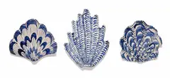 Lucie de Moyencourt, Three glazed ceramic shells with blue and white motifs, hand-painted and glazed ceramic