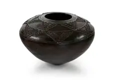 Large vessel with applied relief design by Penny Gumbi, earthenware, sold Jun 2026