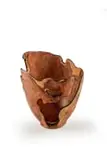 Rodney Band, Wild olive bowl with African blackwood inlay and copper button detailing, wild olive wood