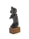 Wilma Cruise, Dachshunds, four, bronze with a dark brown patina, on a found box
