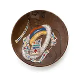 Charger decorated with a portrait of a maiden by Kalahari Studio, terracotta with overglaze slip trail decoration, offered Feb 2025