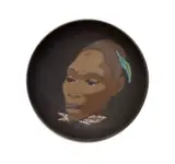 Kalahari Studio, Plate decorated with a portrait of an Ndebele woman with feather, painted and glazed terracotta