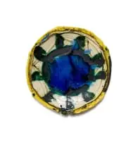 Plate with abstract design in green, blue and yellow by Ruan Hoffmann, 2008, painted and glazed ceramic, sold Nov 2025