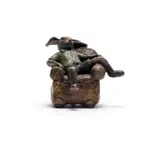Carol Cauldwell, Rabbit in an Armchair, painted bronze and wax