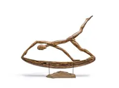 Carl Roberts, Banana Boy, carved wood, on a stone and steel base