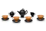 Mervyn Gers Ceramics, Tea set comprising: a teapot, a milk jug, a covered sugar bowl, four cups and four saucers, glazed ceramic