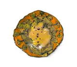 Ruan Hoffmann, Plate with floral motif in orange and gold, painted and glazed ceramic