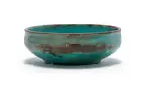 Low-footed bowl by Linn Ware & Ceramic Studio, turquoise- and rust-glazed earthenware, sold May 2025