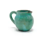 Milk jug by Linn Ware & Ceramic Studio, green-glazed earthenware, sold May 2025